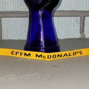McDonald's Yellow Ribbon Bracelet with Black Logo